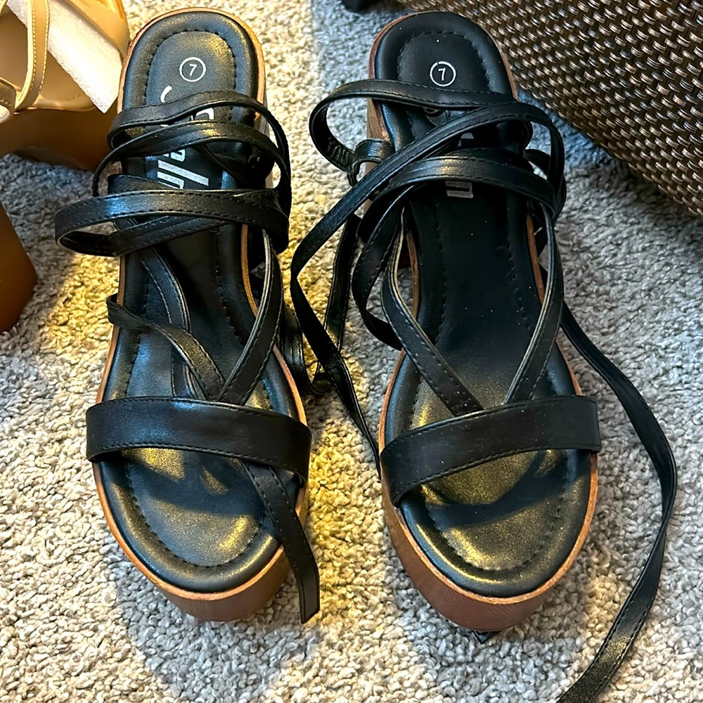 Worn once. Wrap up platforms.